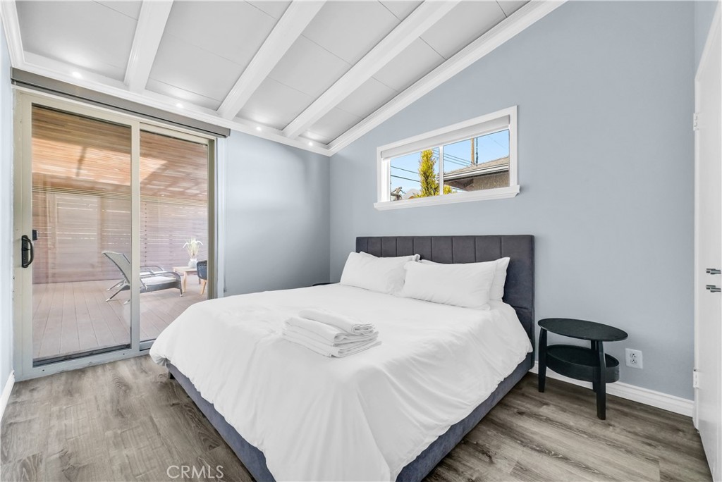 645 South Trident Street Anaheim, CA 92804 - Photo 21 of 30 a bedroom with a bed and a table