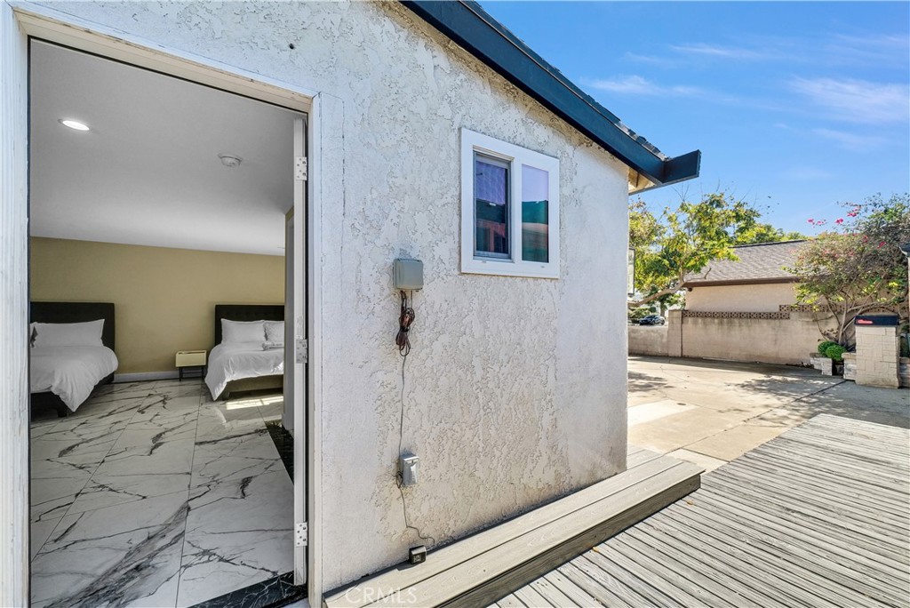 645 South Trident Street Anaheim, CA 92804 - Photo 23 of 30 a view of a house with backyard and sitting area