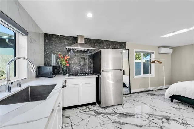 a view of a house with backyard and porch
