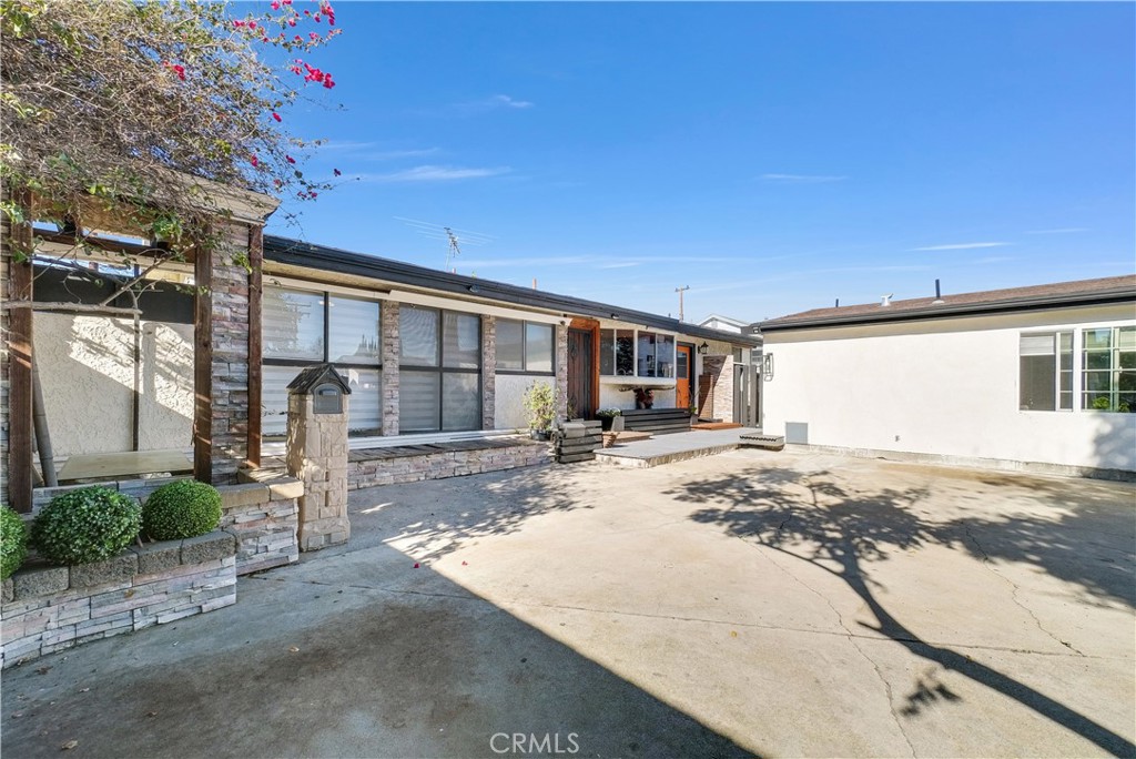 645 South Trident Street Anaheim, CA 92804 - Photo 6 of 30 a view of a house with snow on the road