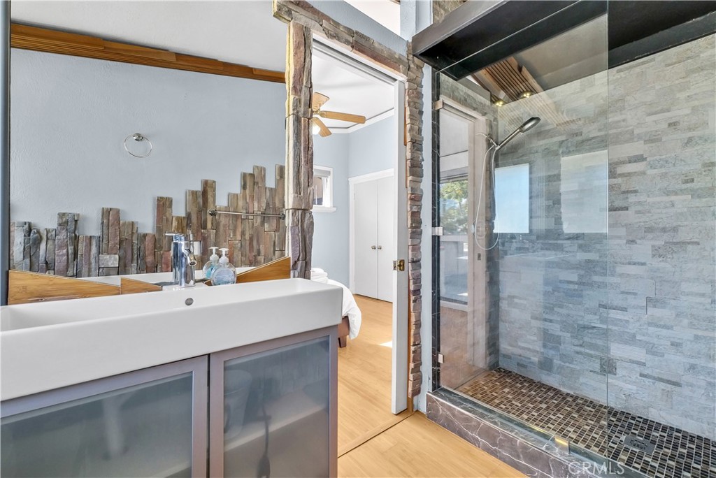 645 South Trident Street Anaheim, CA 92804 - Photo 7 of 30 a room with a sink and a mirror