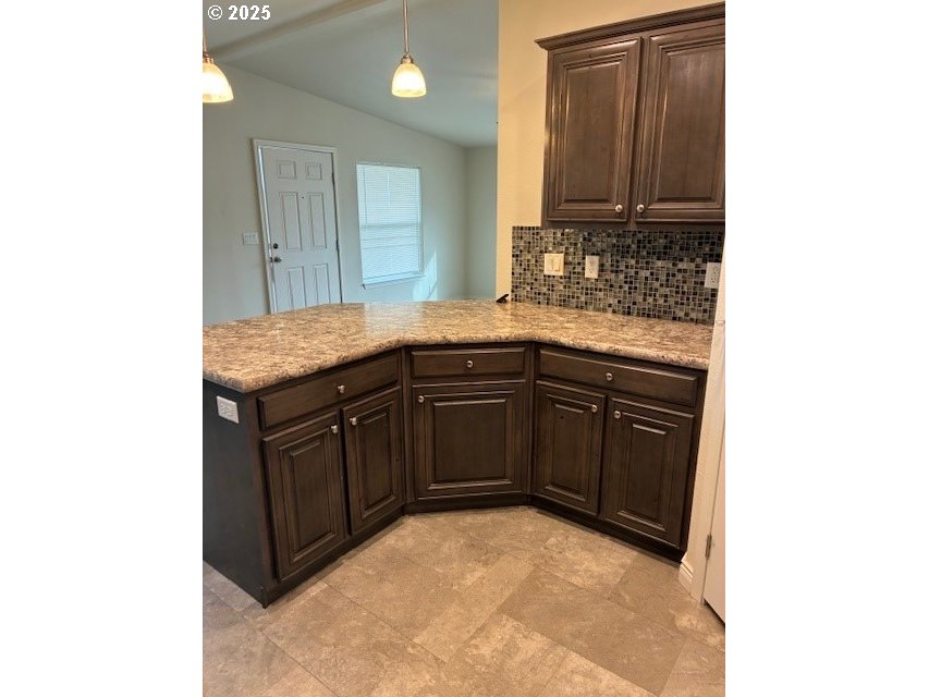 3108 Southwest River View Drive Pendleton, OR 97801 - Photo 21 of 37 a kitchen with a sink and cabinets