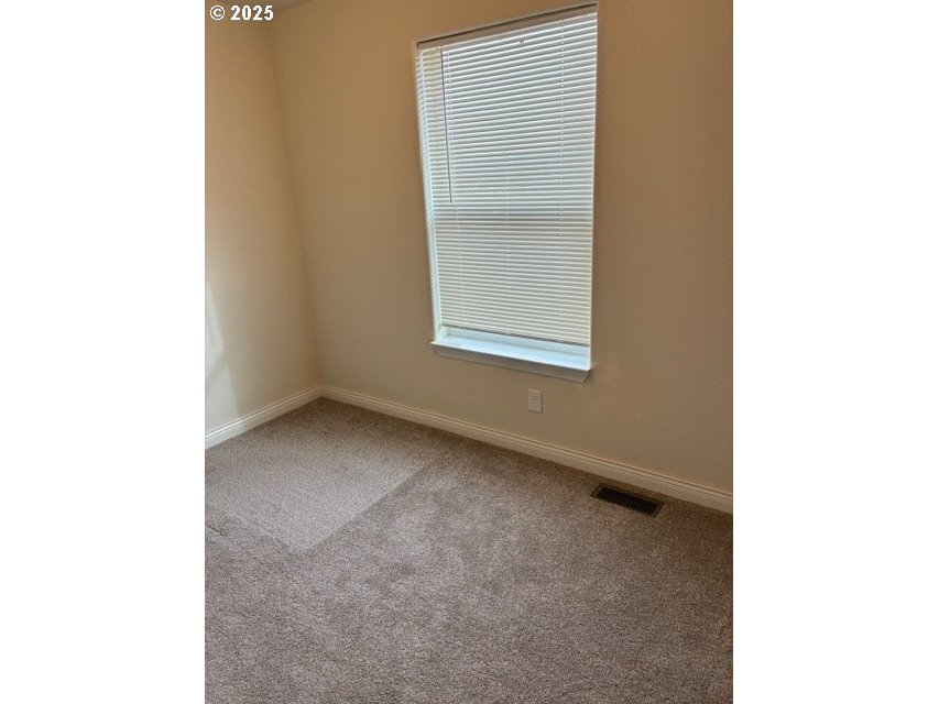 3108 Southwest River View Drive Pendleton, OR 97801 - Photo 26 of 37 a view of an empty room with a window