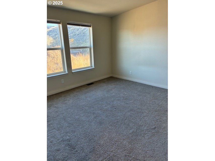 3108 Southwest River View Drive Pendleton, OR 97801 - Photo 8 of 37 a view of an empty room with a window