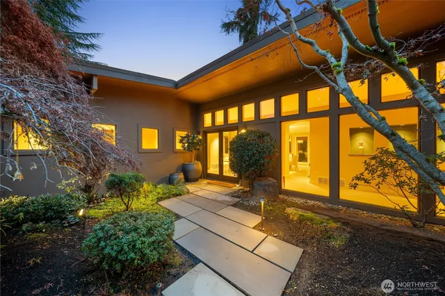 a view of backyard with a patio
