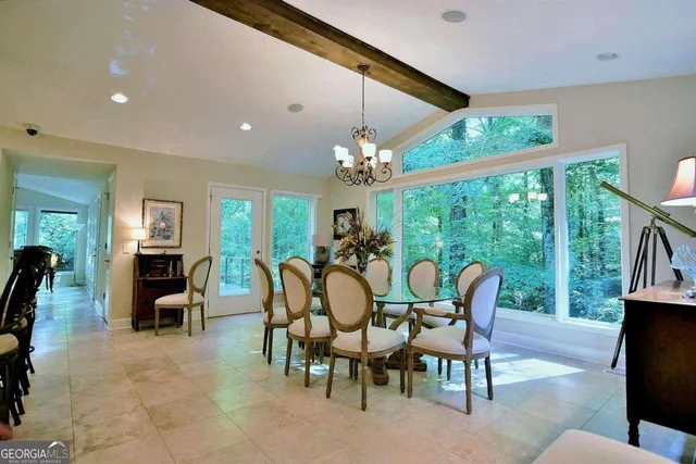 a view of a livingroom with furniture and window