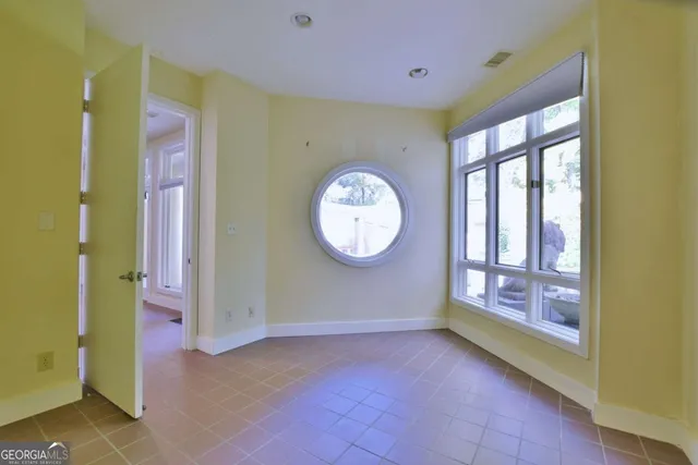 a view of a backyard with sitting area