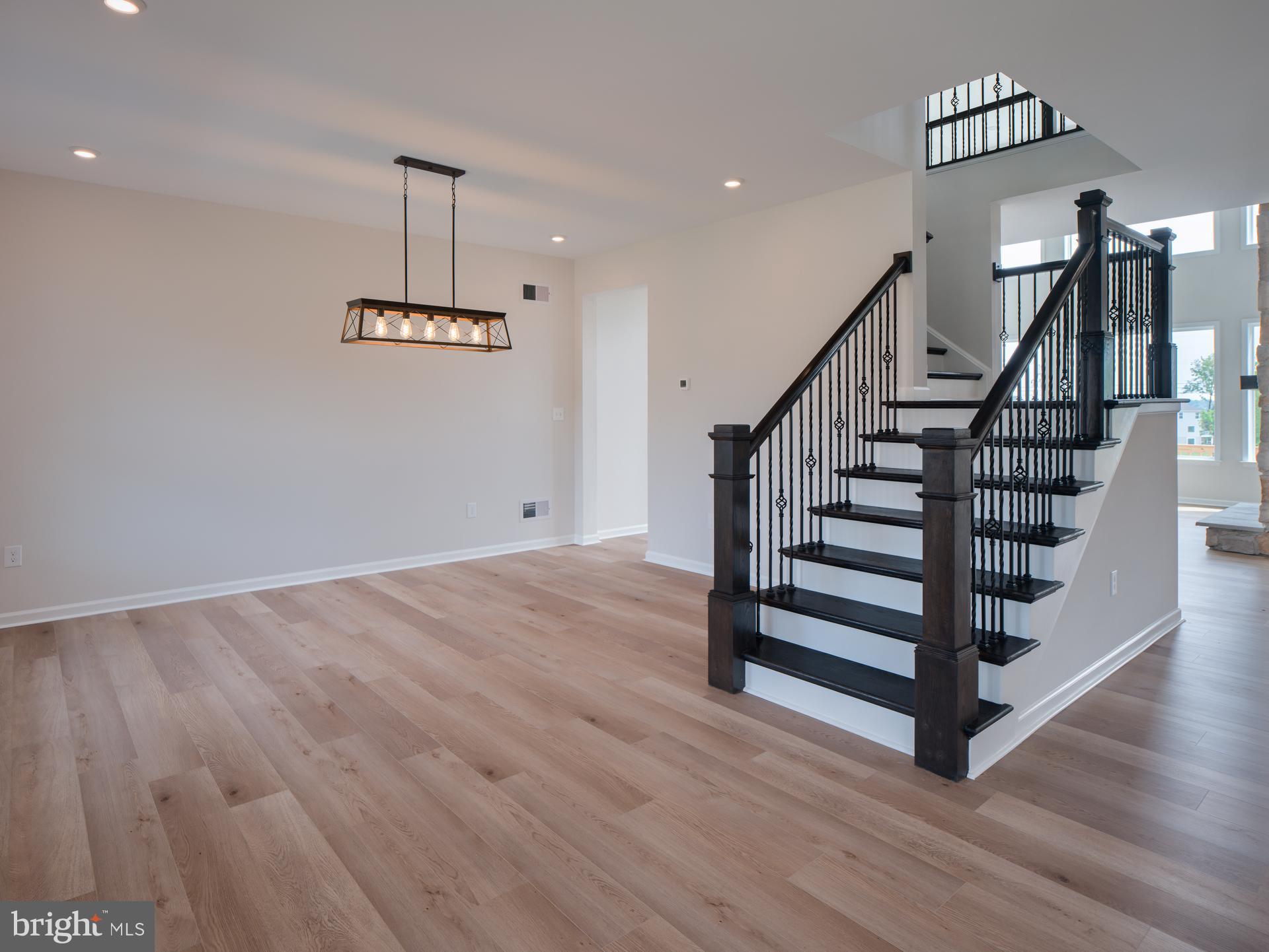 232 West Side Drive Lititz, PA 17543 - Photo 11 of 27 a view of entryway and hall with wooden floor