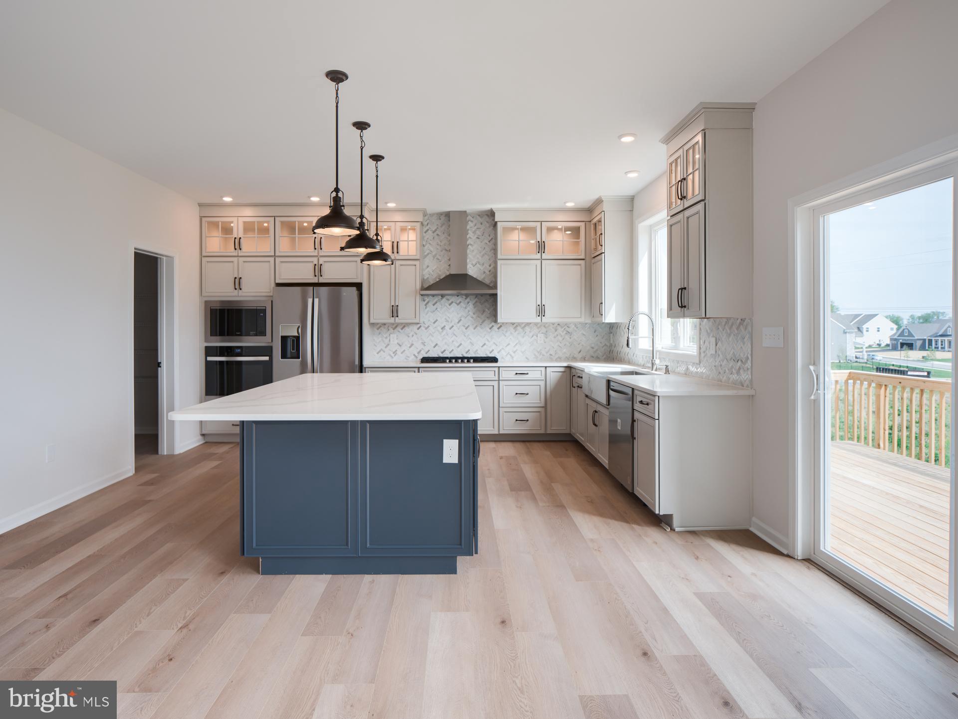 232 West Side Drive Lititz, PA 17543 - Photo 2 of 27 a kitchen with stainless steel appliances granite countertop a stove a sink and a refrigerator