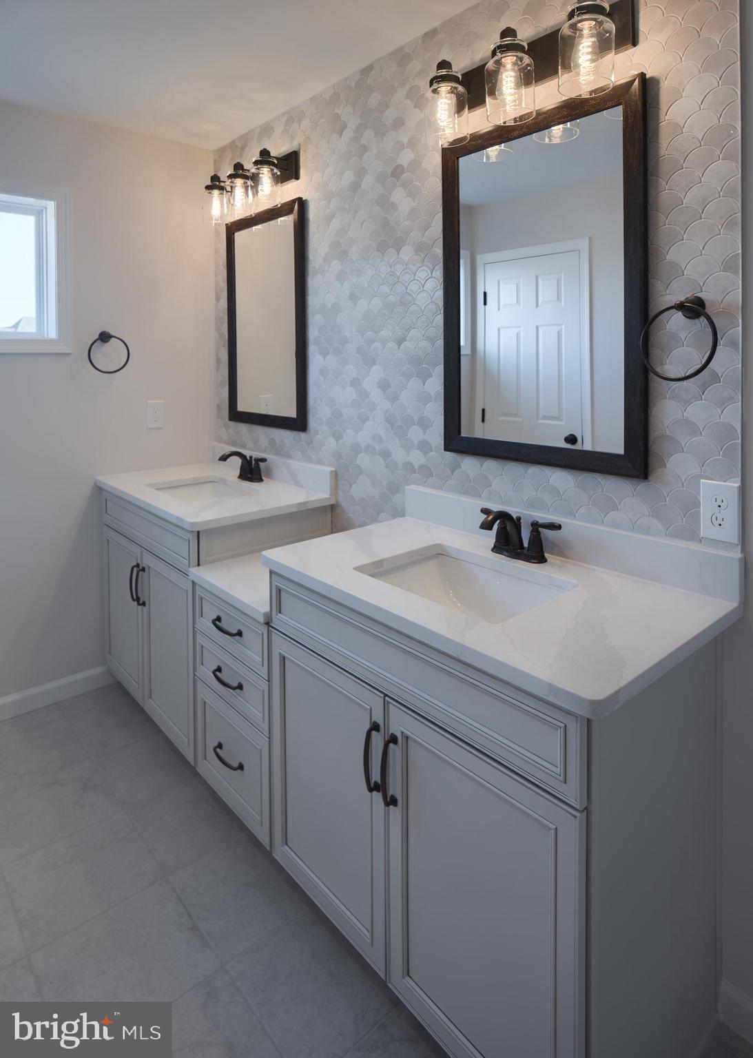 232 West Side Drive Lititz, PA 17543 - Photo 23 of 27 a bathroom with a double vanity sink mirror and