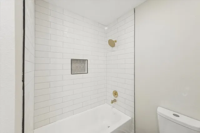 a bathroom with a bathtub