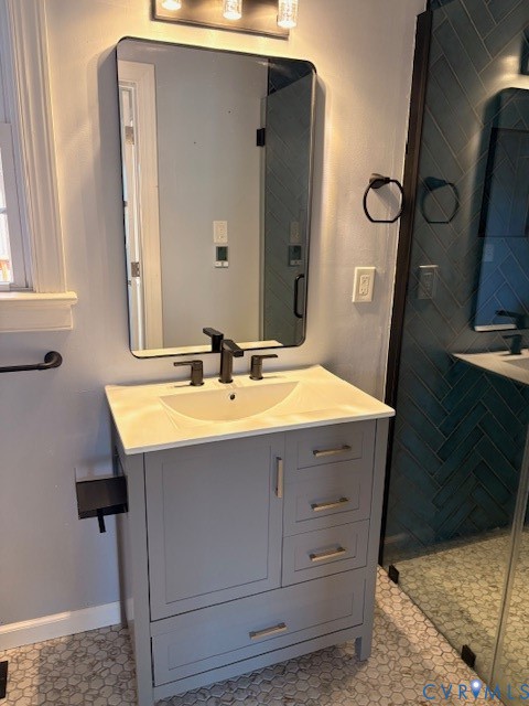 16487 Mountain Road Montpelier, VA 23192 - Photo 15 of 16 a bathroom with a sink vanity and mirror