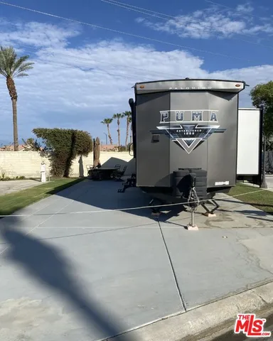 a view of a street with an outdoor space