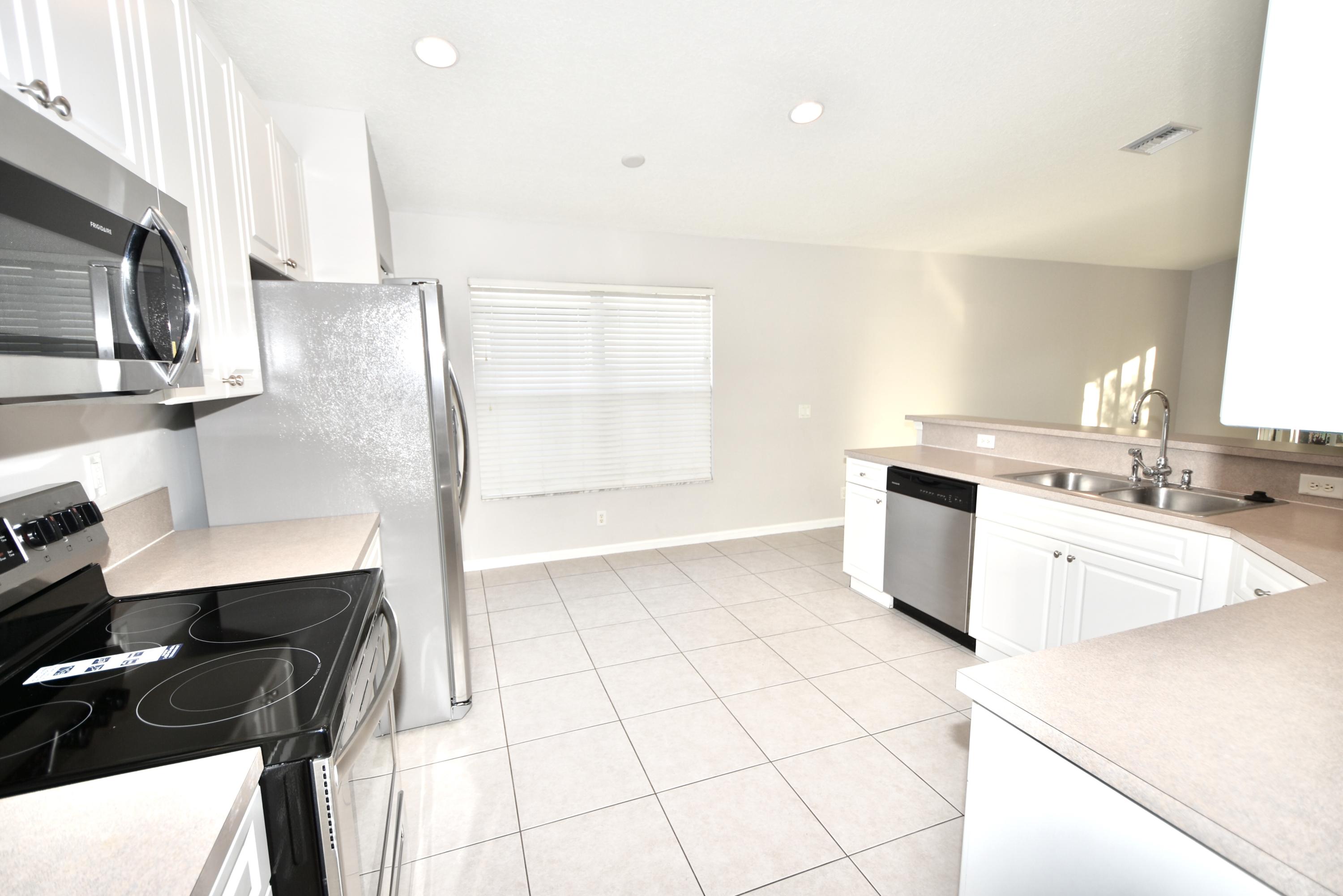 2512 Southwest Century Way Stuart, FL 34997 - Photo 13 of 52 Kitchen Entry