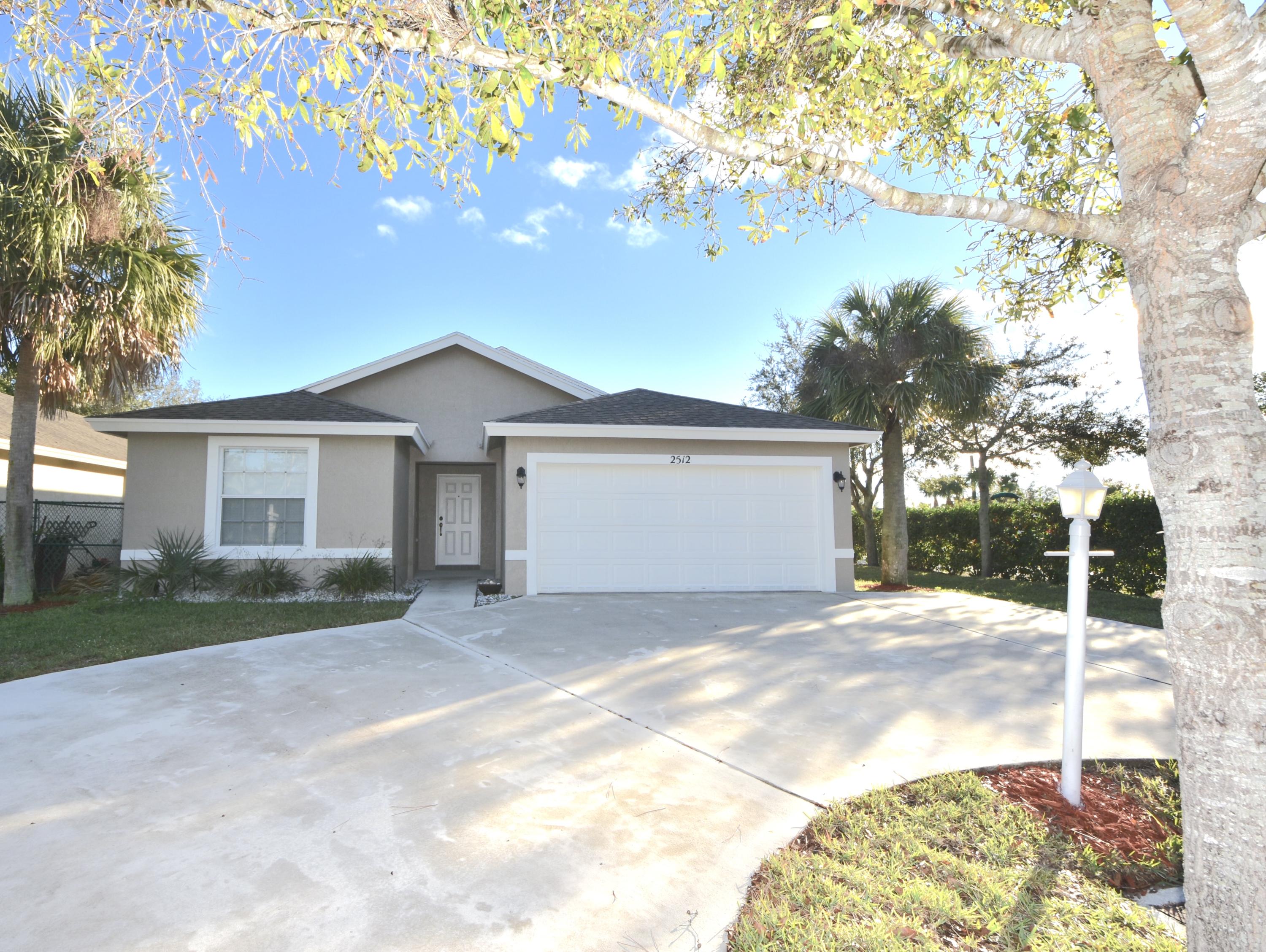 2512 Southwest Century Way Stuart, FL 34997 - Photo 2 of 52 Large Driveway
