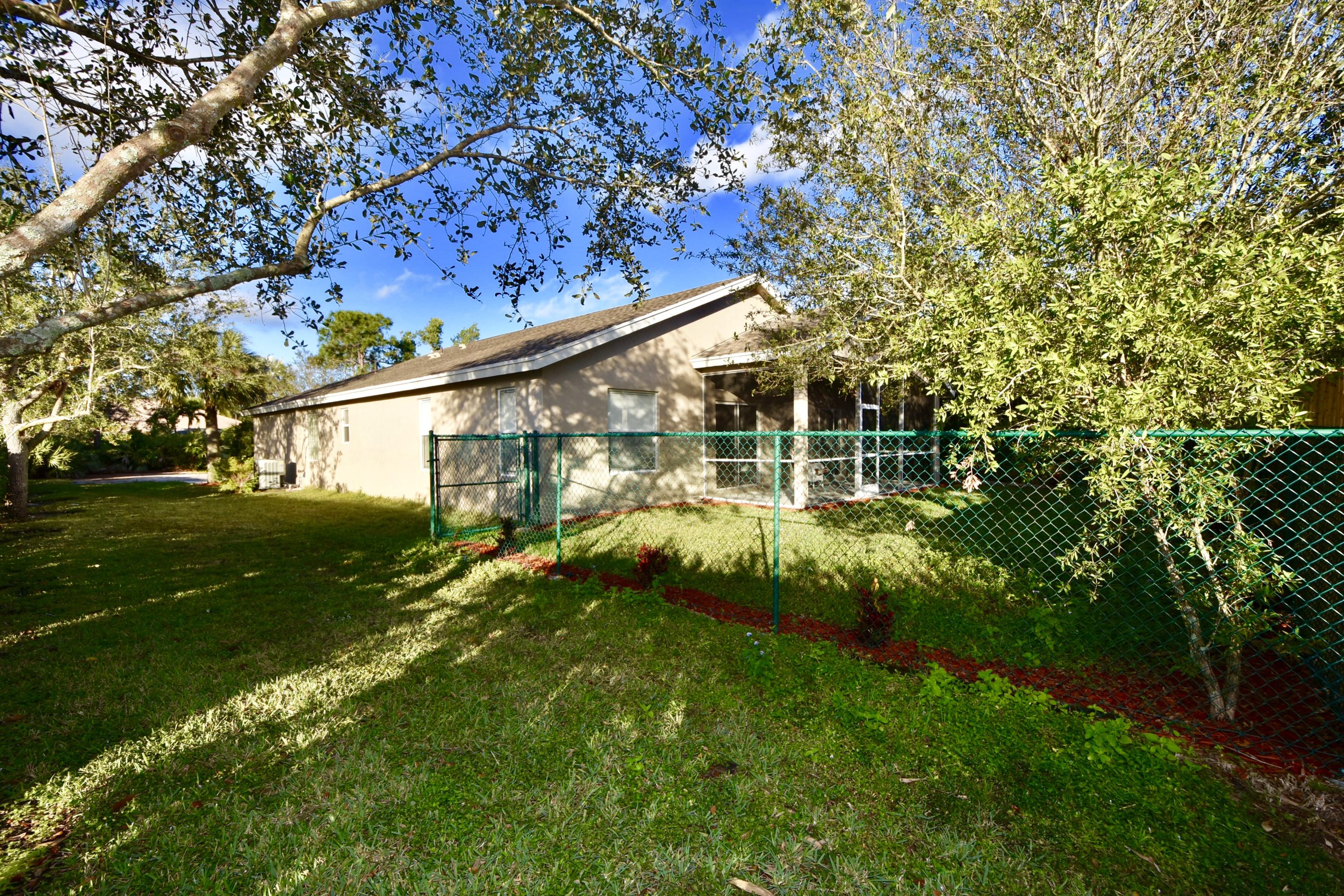 2512 Southwest Century Way Stuart, FL 34997 - Photo 30 of 52 Fenced in Yard