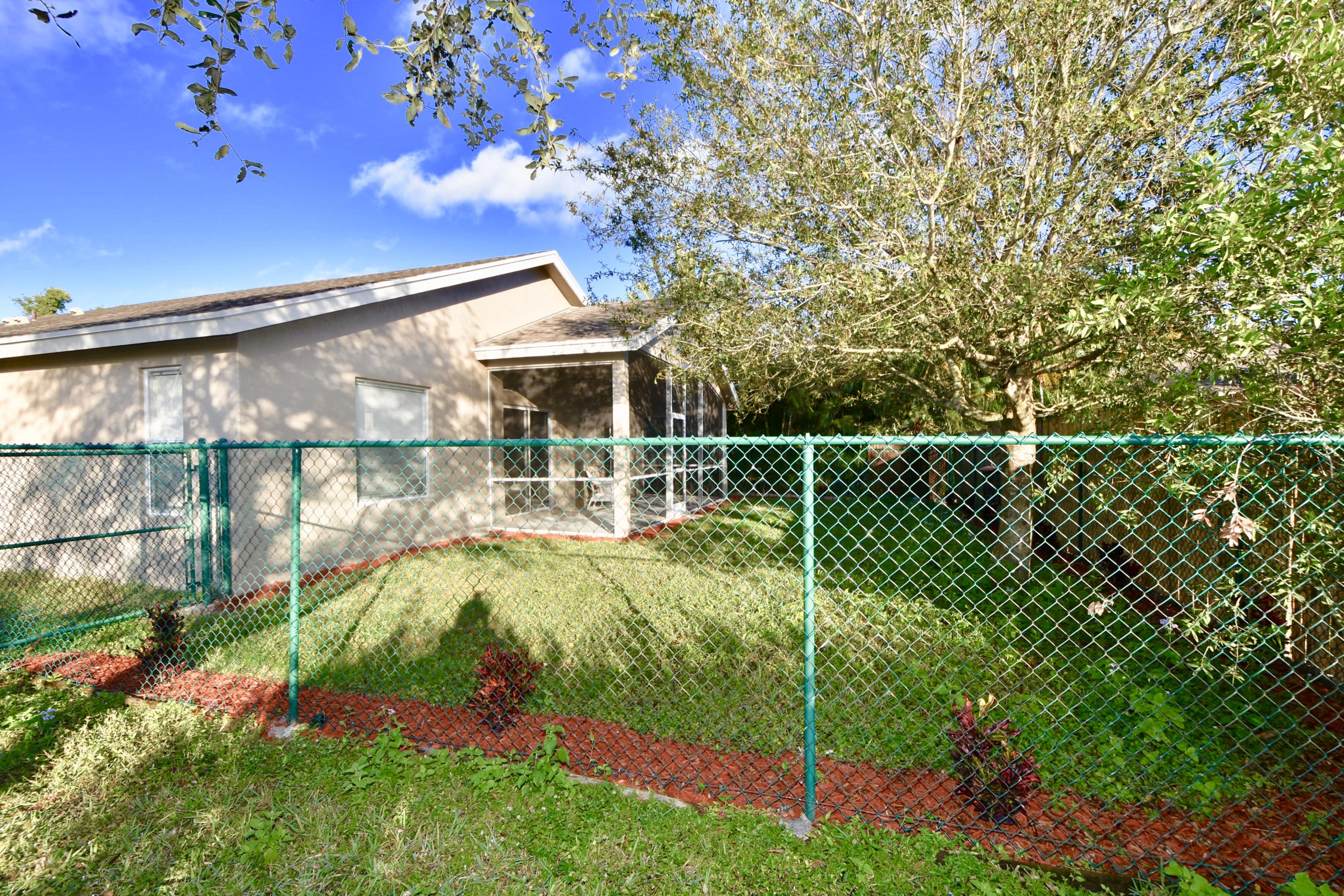 2512 Southwest Century Way Stuart, FL 34997 - Photo 31 of 52 Fenced in Yard