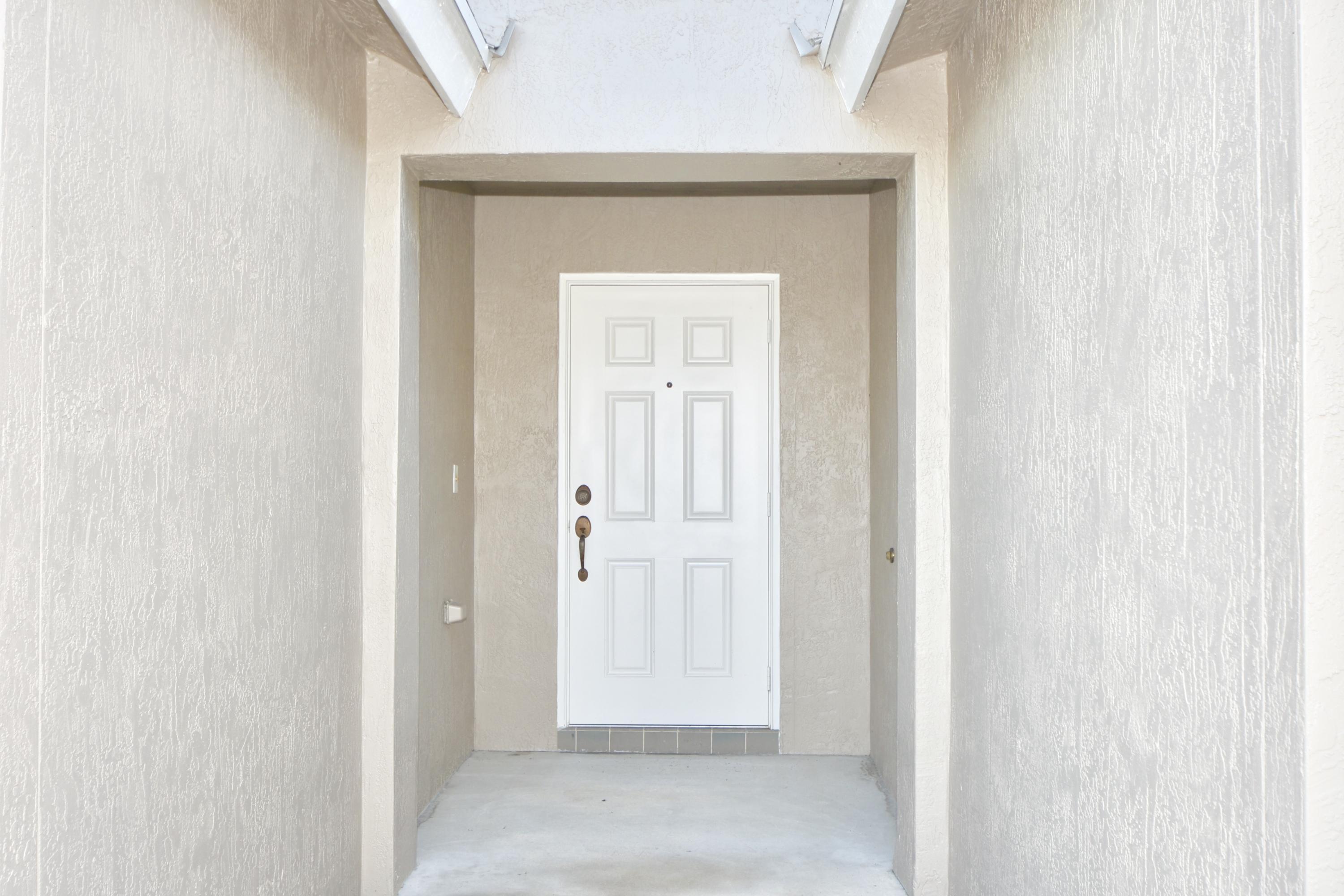 2512 Southwest Century Way Stuart, FL 34997 - Photo 5 of 52 Privacy Front Door