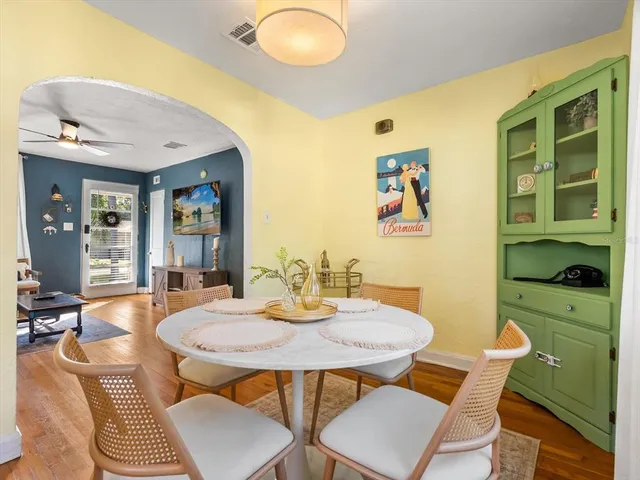 a view of a dining room with furniture