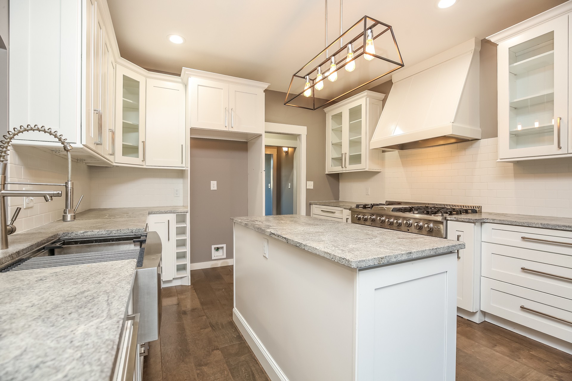 259 Harrowgate Drive Clarksville, TN 37043 - Photo 14 of 27 a kitchen with a stove a sink and a refrigerator