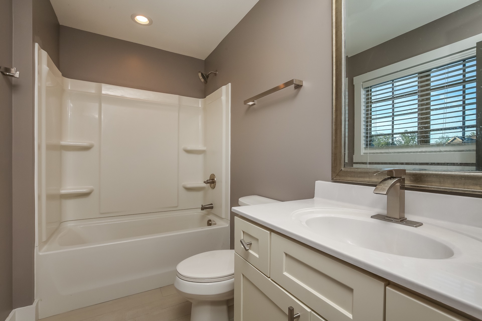 259 Harrowgate Drive Clarksville, TN 37043 - Photo 24 of 27 a bathroom with a sink a toilet and shower