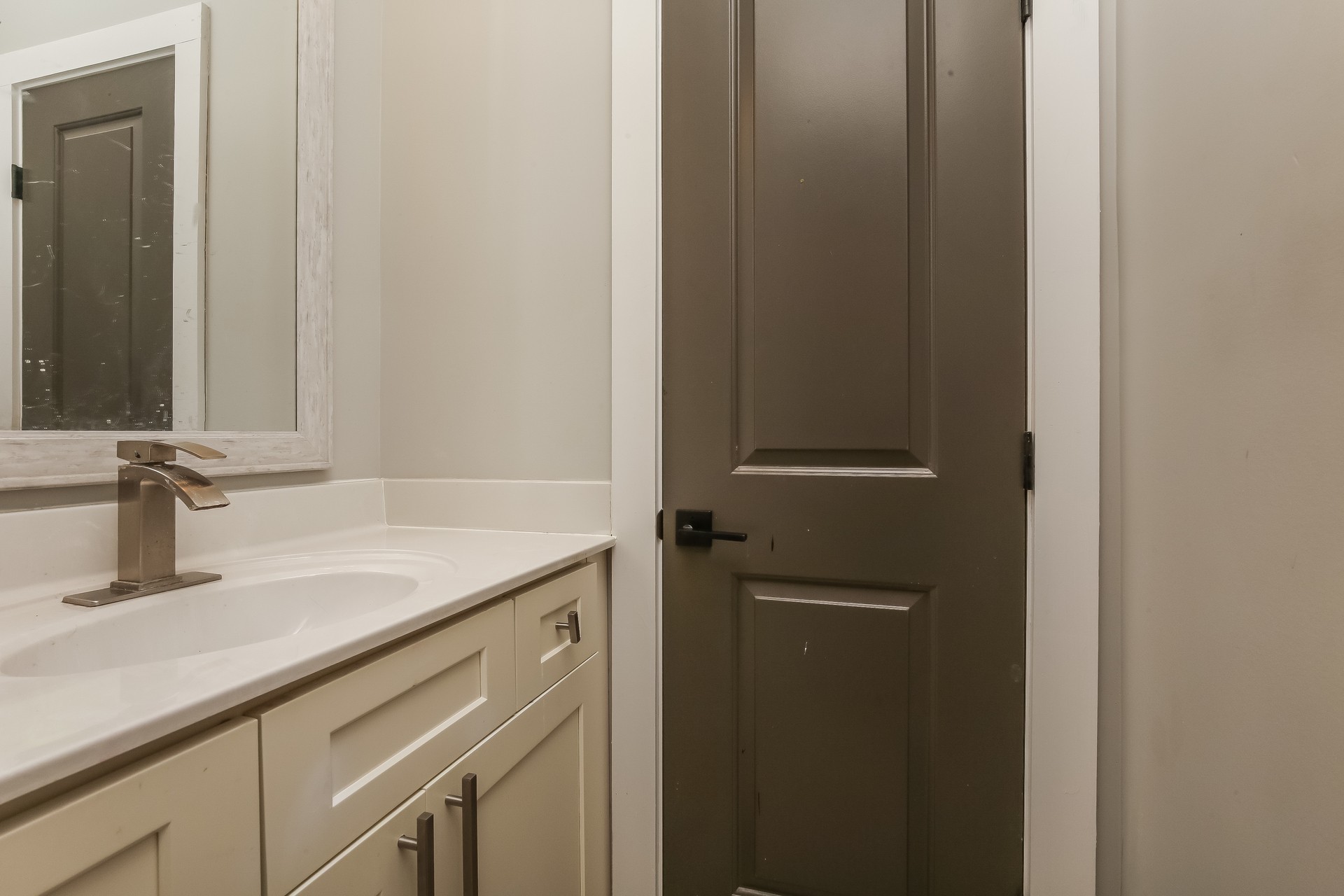 259 Harrowgate Drive Clarksville, TN 37043 - Photo 26 of 27 a bathroom with a sink and a mirror