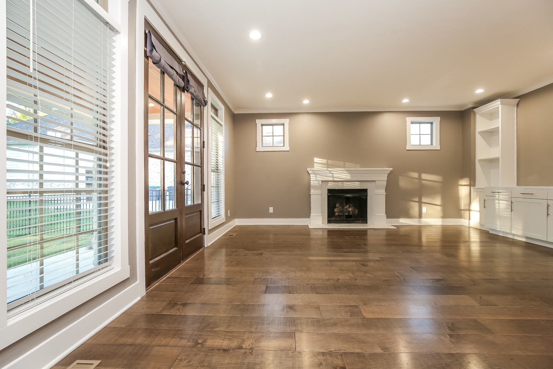 259 Harrowgate Drive Clarksville, TN 37043 - Photo 9 of 27 a view of an empty room with a fireplace and a window