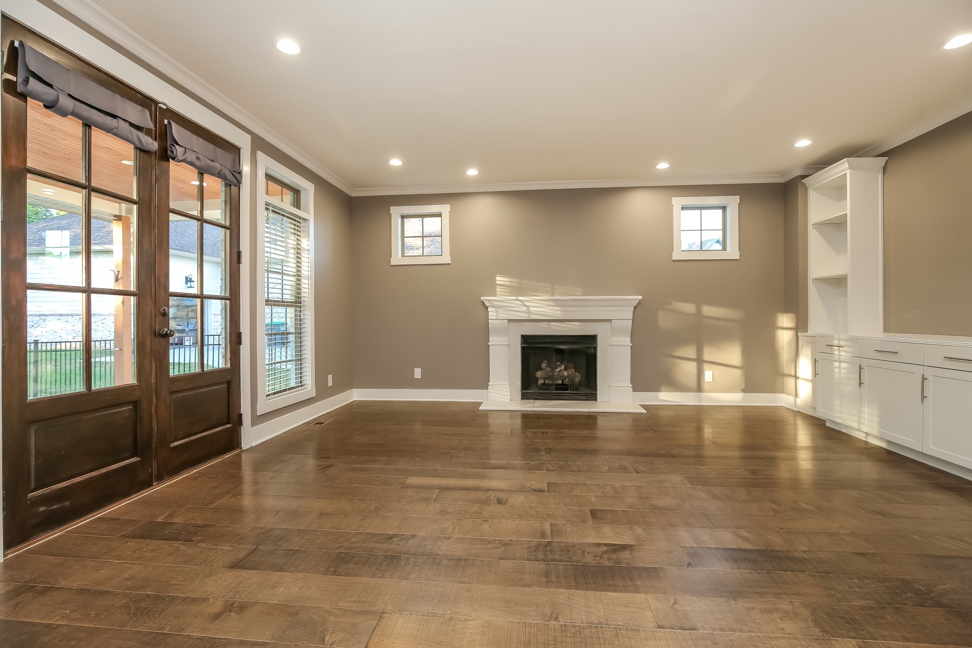 259 Harrowgate Drive Clarksville, TN 37043 - Photo 10 of 27 a view of an empty room with a fireplace and a window