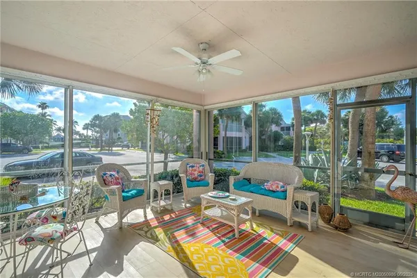 a living room filled with furniture and a table