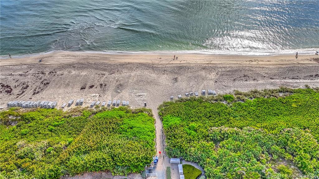 411 Northeast Plantation Road, Unit 511 Stuart, FL 34996 - Photo 38 of 45 a view of a yard with plants and wooden fence