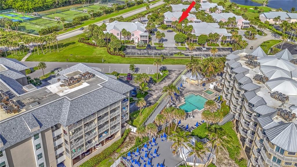 411 Northeast Plantation Road, Unit 511 Stuart, FL 34996 - Photo 42 of 45 an aerial view of a houses with yard