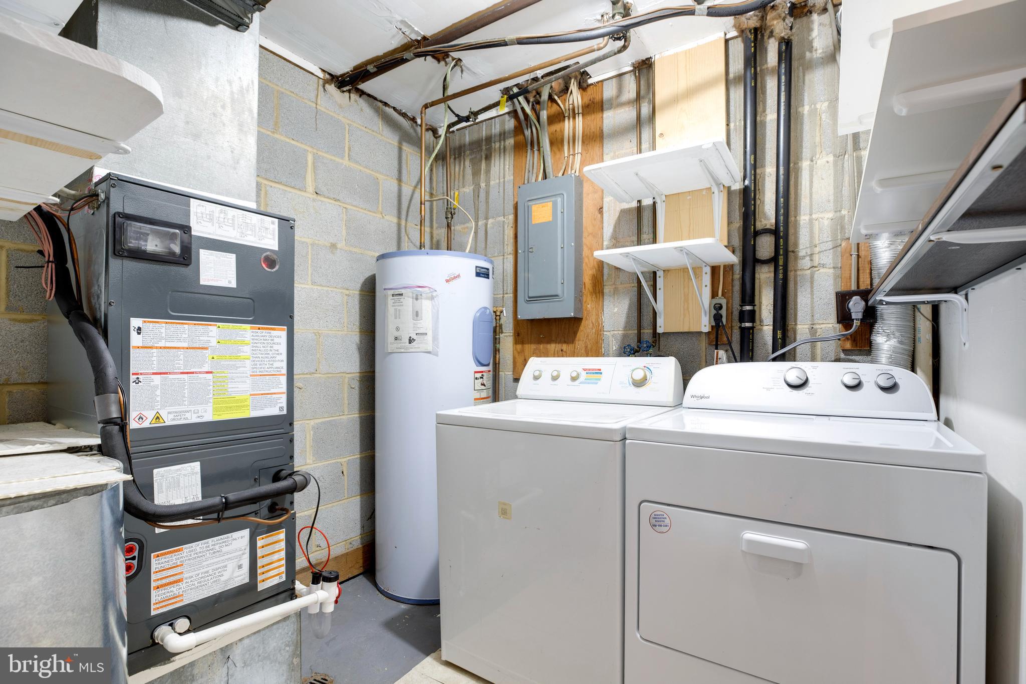 6421 Birch Leaf Court, Unit 36A Burke, VA 22015 - Photo 15 of 26 a utility room with dryer and washer