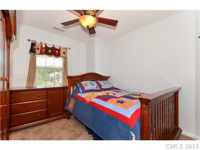 15363 Michael Andrew Road Huntersville, NC 28078 - Photo 11 of 16 a bedroom with a bed and a window