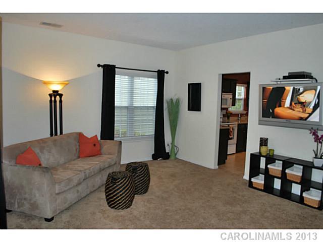 15363 Michael Andrew Road Huntersville, NC 28078 - Photo 3 of 16 a living room with furniture and a window