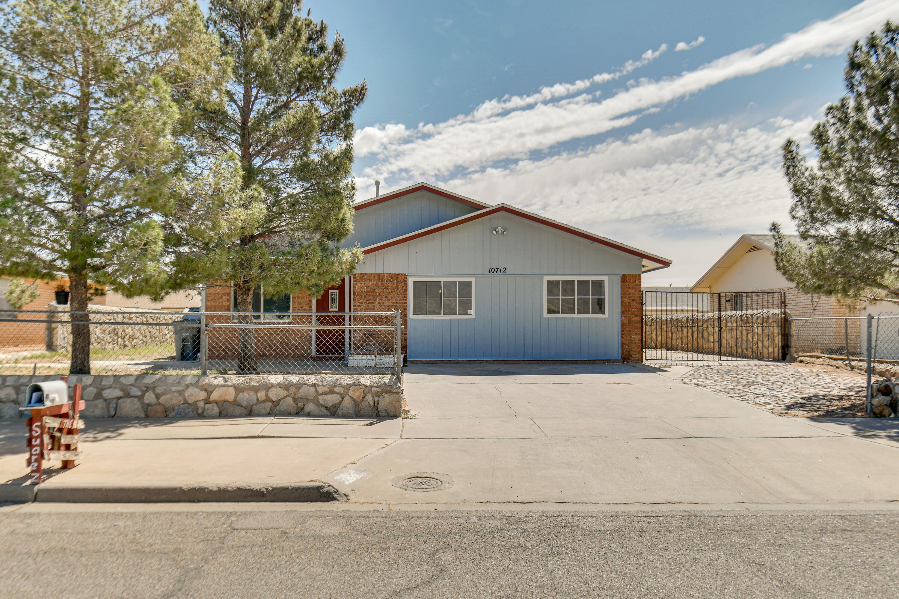 a front view of a house with a entertaining space
