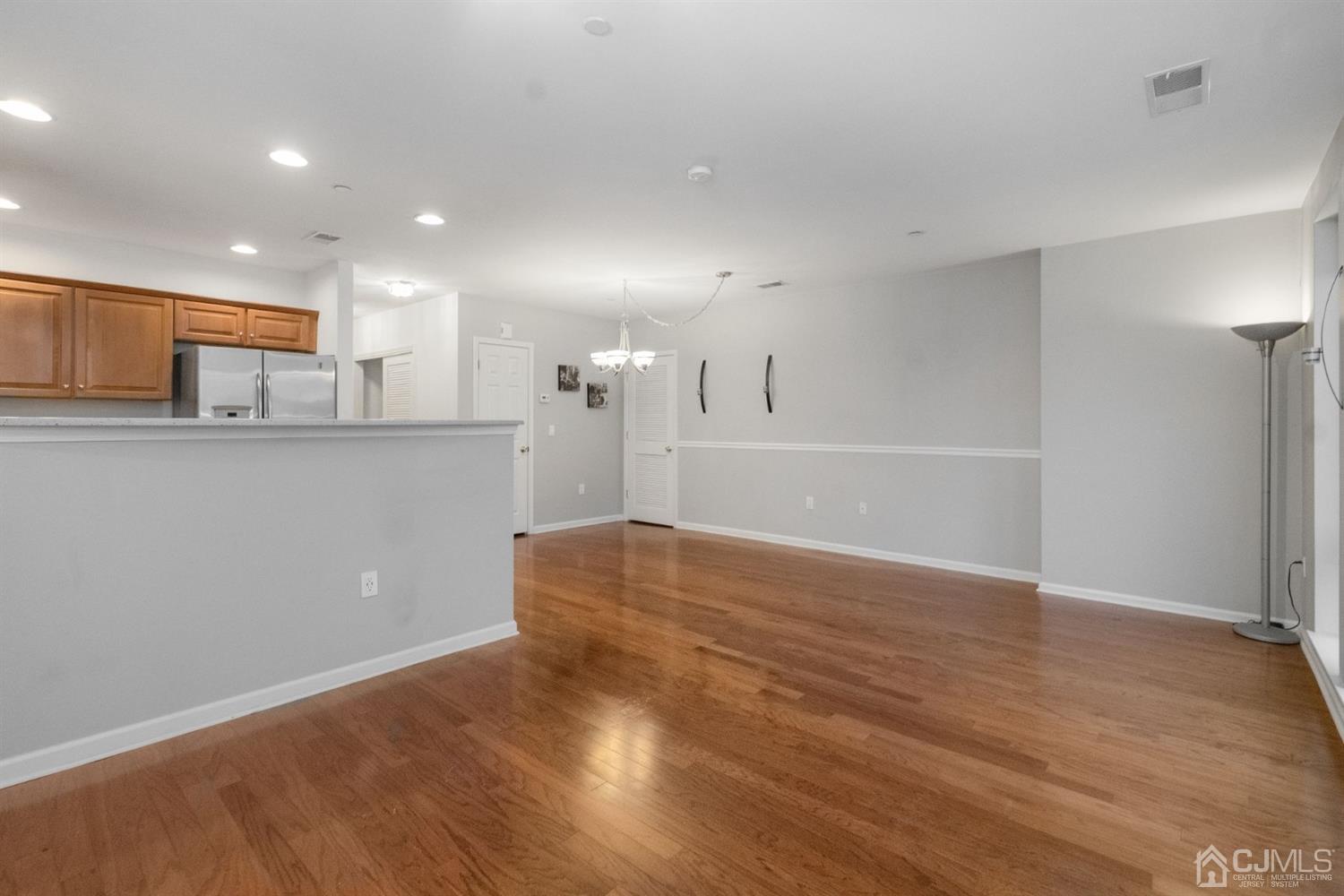 368 Rector Street, Unit 422 Perth Amboy, NJ 08861 - Photo 4 of 17 a view of a kitchen with a sink and a refrigerator