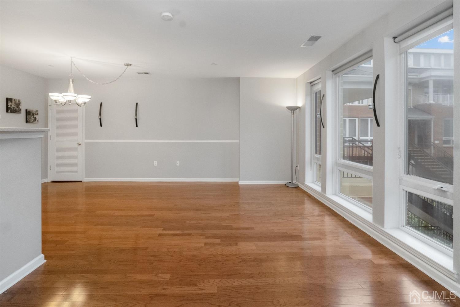 368 Rector Street, Unit 422 Perth Amboy, NJ 08861 - Photo 5 of 17 a view of an empty room with a window