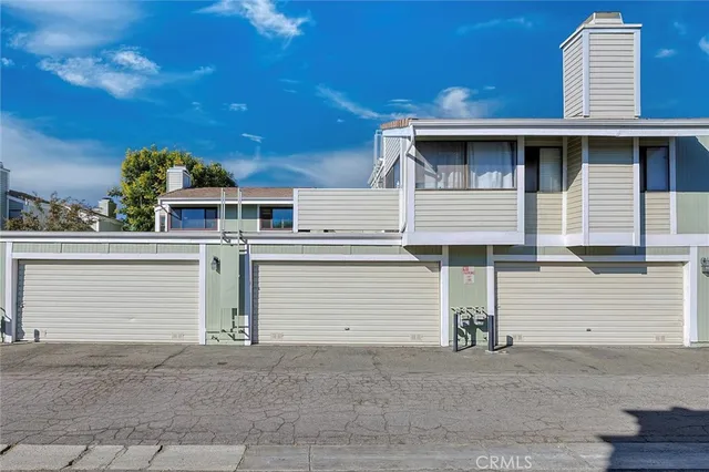 a view of a house with a garage