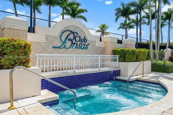 a view of a chair and table in the patio