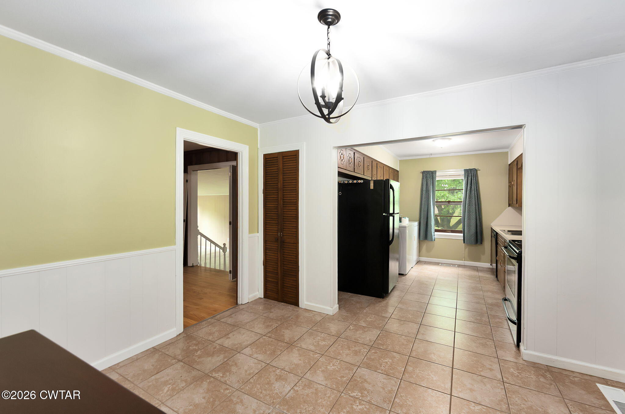 118 Radio Road Jackson, TN 38301 - Photo 3 of 22 a view of a hallway with windows and chandelier