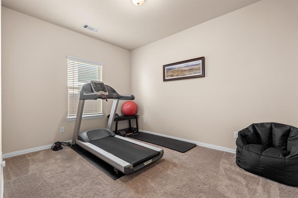 4207 Whispering Willow Way Arlington, TX 76005 - Photo 11 of 31 a living room with furniture and a air conditioner vent