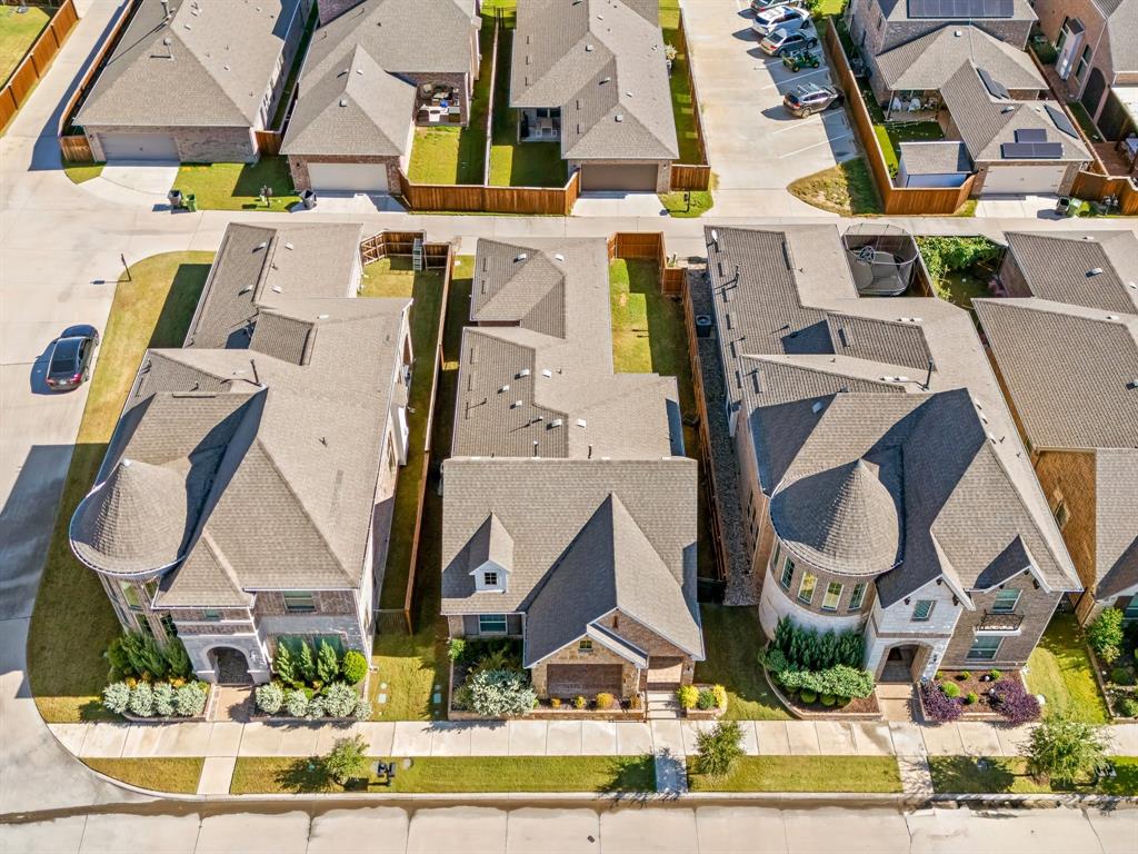 4207 Whispering Willow Way Arlington, TX 76005 - Photo 28 of 31 an aerial view of residential houses with outdoor space