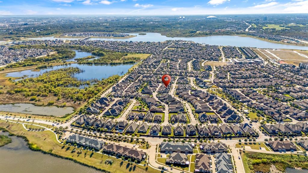4207 Whispering Willow Way Arlington, TX 76005 - Photo 30 of 31 an aerial view of residential building and lake view