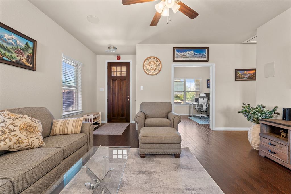 4207 Whispering Willow Way Arlington, TX 76005 - Photo 7 of 31 a living room with furniture and a couch
