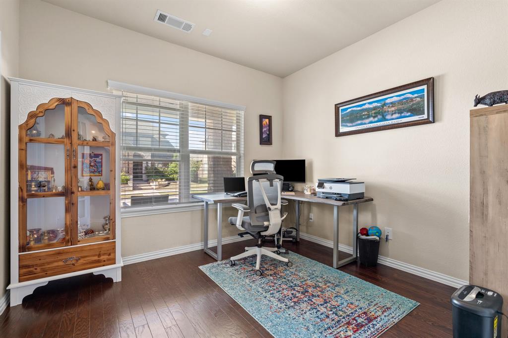 4207 Whispering Willow Way Arlington, TX 76005 - Photo 8 of 31 a view of a workspace with furniture and a window