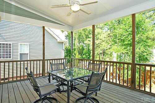 5900 Currin Fox Court Raleigh, NC 27616 - Photo 2 of 10 a view of a patio with a table and chairs
