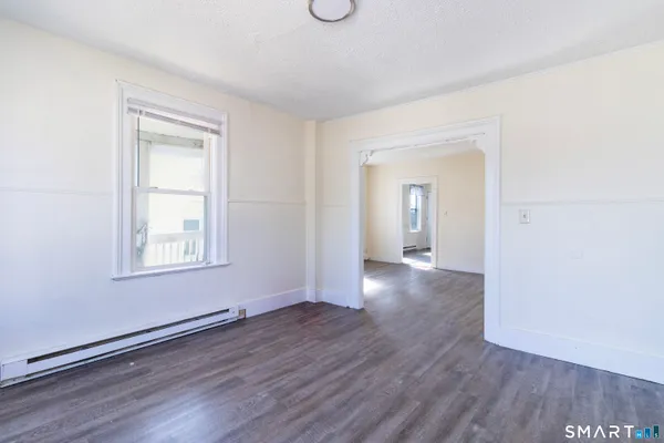 a view of livingroom with hardwood floor and window