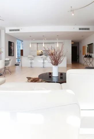 a picture of a living room with a couch