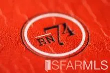 a building outdoor space with patio furniture and potted plants