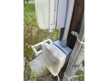 124 Woodland Road Goldendale, WA 98620 - Photo 26 of 27 a view of living room with a floor to ceiling window